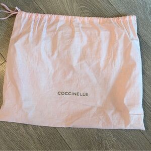 Coccinelle pink dust bag